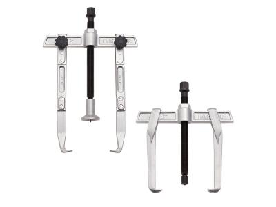 Reversible jaw pullers